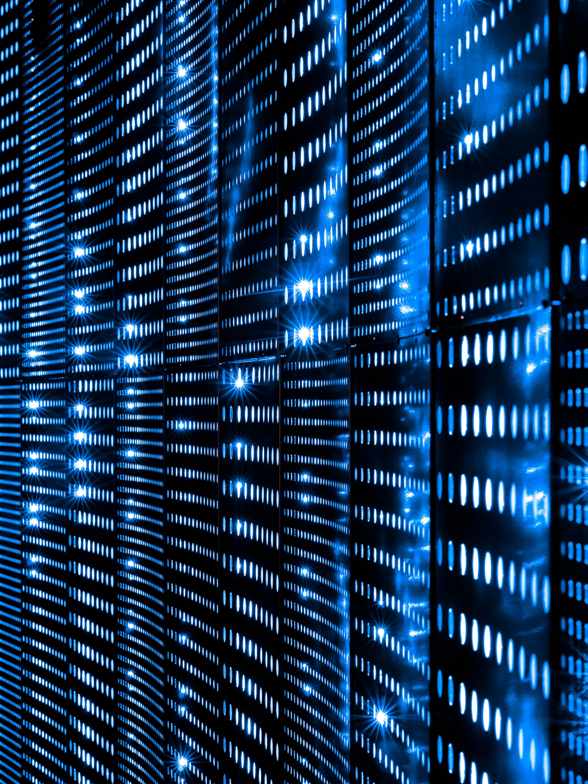 A data server rack with lots of blue lights.